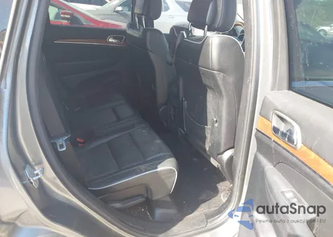 2013 Jeep Grand Cherokee Overland из США, поврежденный, VIN 1C4RJFCT7DC524411